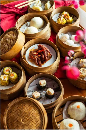 Πίνακας Delicious Dim Sum Feast Νόστιμη γιορτή Dim Sum 70x100cm