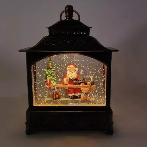 Χριστουγεννιάτικο Διακοσμητικό Χωριό 33819 Μπαταρίας με Φως & Κίνηση 13.5x5x19cm Καφέ