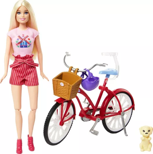 Barbie Doll On A Bicycle A Dog